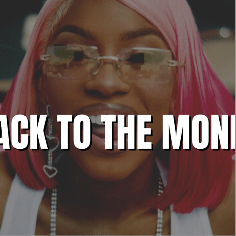 A person with pink hair and sunglasses smiles widely, adorned with heart-shaped earrings and a necklace. The phrase "Back to the Money" is overlaid on the image, partially covering their face, infusing a playful sense of optimism and energy into the scene.